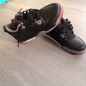 Jordan 4 Bred “ Reimagined “ Black and Red Kids Sneakers